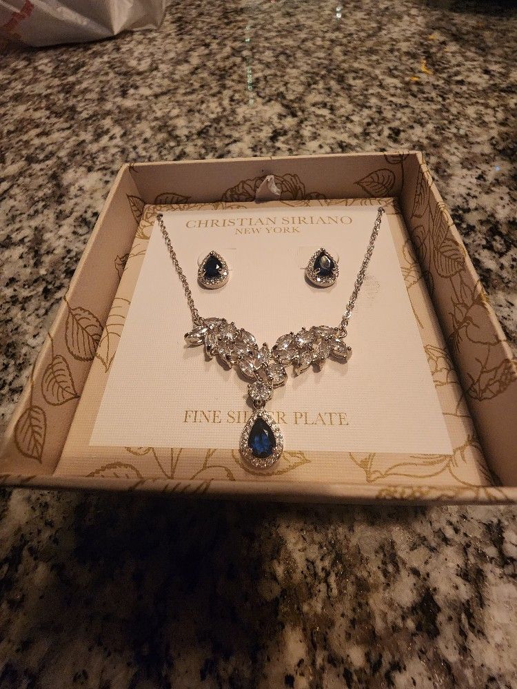 Amazing Silver Necklace And Blue Earrings