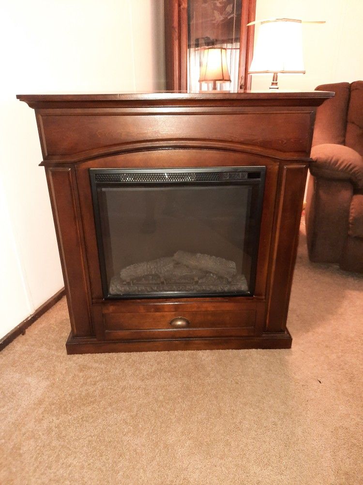 Lowes All Wood Electric Fireplace for Sale in Wilson, NC - OfferUp