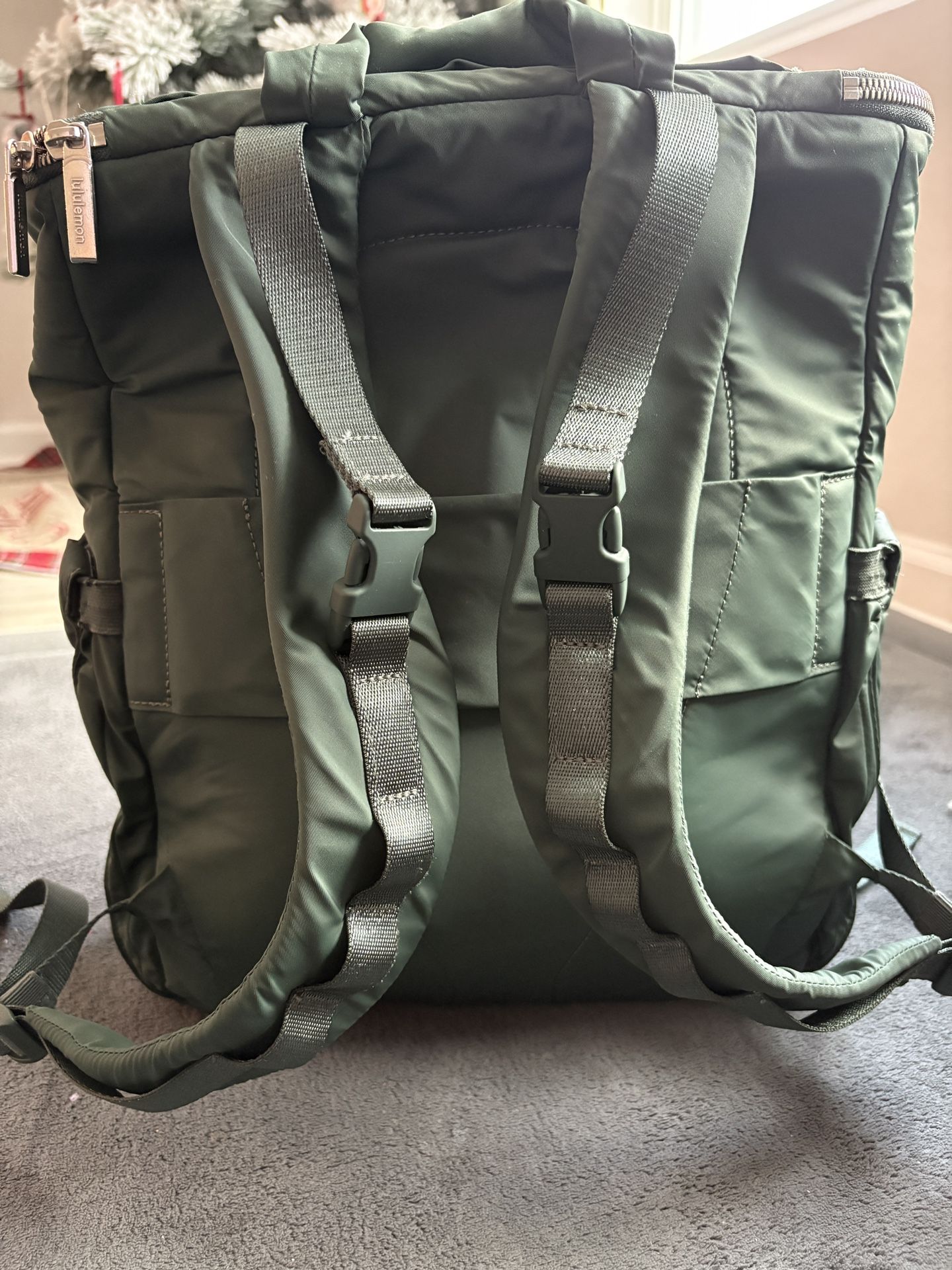 Green Lululemon new parent backpack
