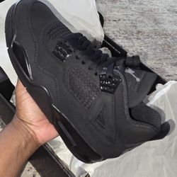 Black Cat Jordan 4s 