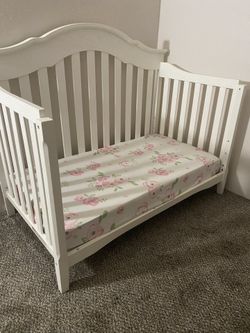 Delta Children 4-in-one convertible crib