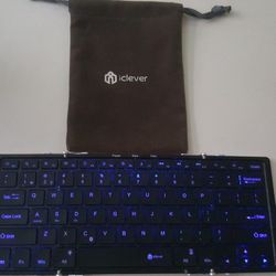 iClever Foldable Bluetooth keyboard with light key.