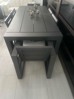 Brand New Arhaus Dark Gray Dining Table with Chairs