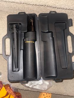Bushnell 12–36×50 spotting scope with tripod and hard case.