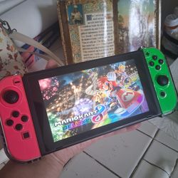 Nintendo switch  Handheld  Console - Neon green  HOT PINK  - joy cons in Excellent  Condition  adult  owned