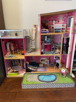 Barbie house with Furniture and dolls