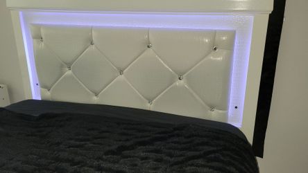 Queen headboard w/frame, one nightstand, and dresser with mirror.