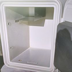 Fireproof safe. Three holes on bottom to secure to floor