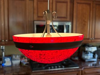 Two red glass pendant lights