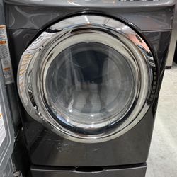 Grey Samsung Front Load Dryer On Pedestal