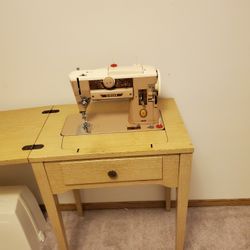 Singer Sewing Machine With Cabinet