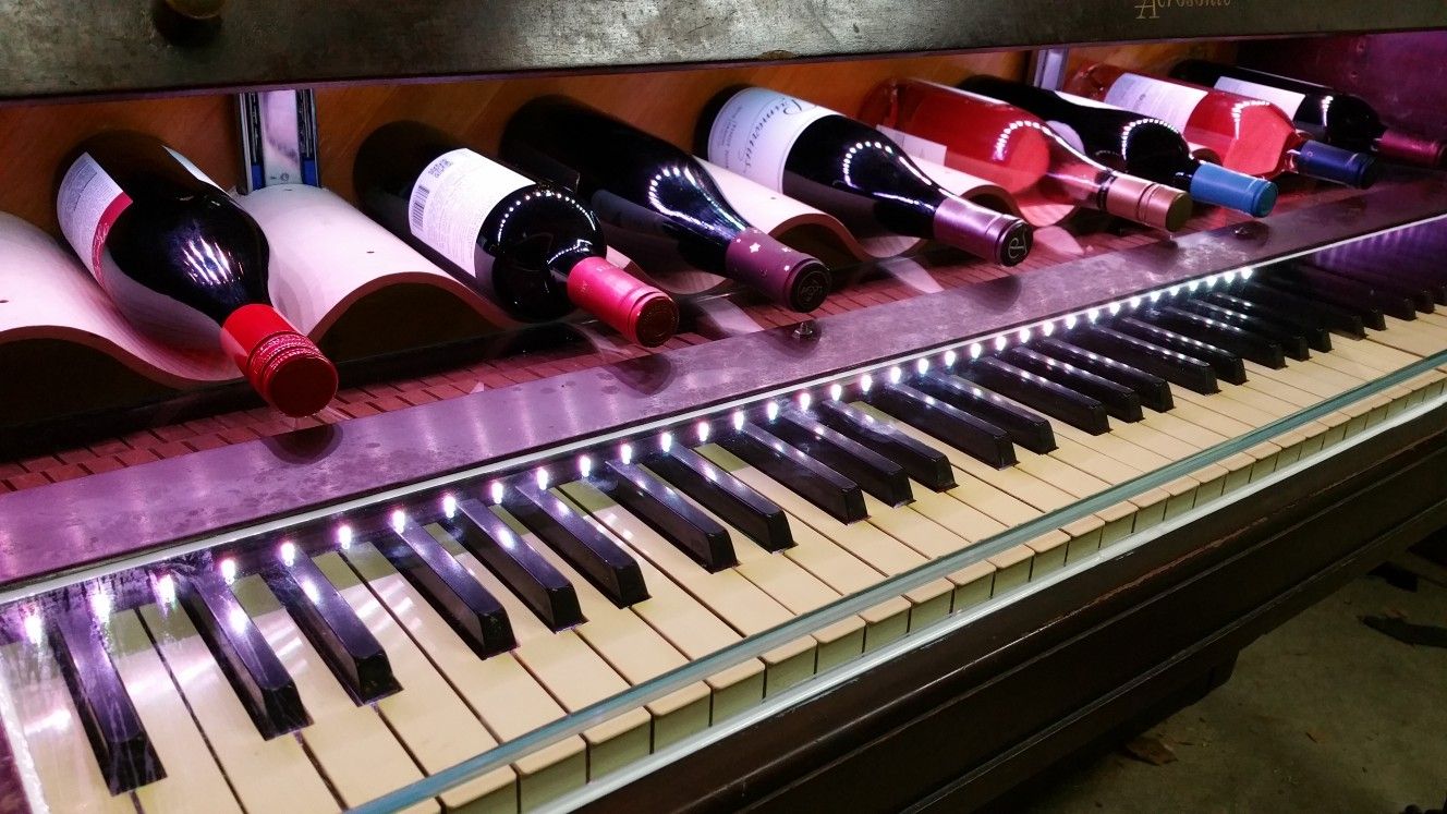 Piano Wine Bar with custom hidden compartments and lighting
