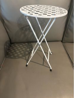 Used like new metal foldable  plant stand