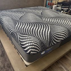 Sealy Posturepedic Plus Hybrid standard king mattress.