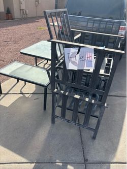 Two tables and 4 chairs