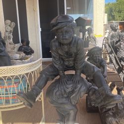 Boy Jumping Over Another Boy Statue