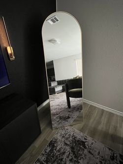 Gold standing mirror