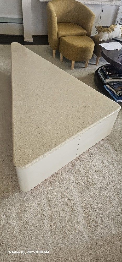 Contemporary Coffee Table Has Small Drawer