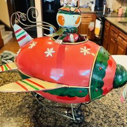Antique Metal Tin Snowman Figure in a Plane Table Top Decor. Christmas Holiday.