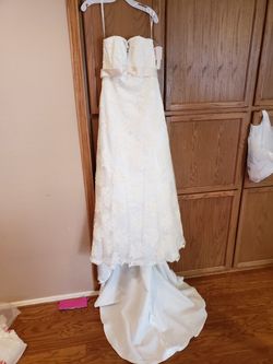 David's Bridal Strapless Illusion Wedding Dress, never worn.