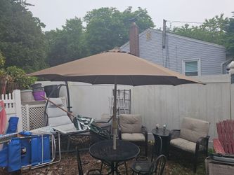 Price is firm.. beautiful fortunoff 8-ft patio umbrella