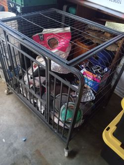 Dog cage with wheels