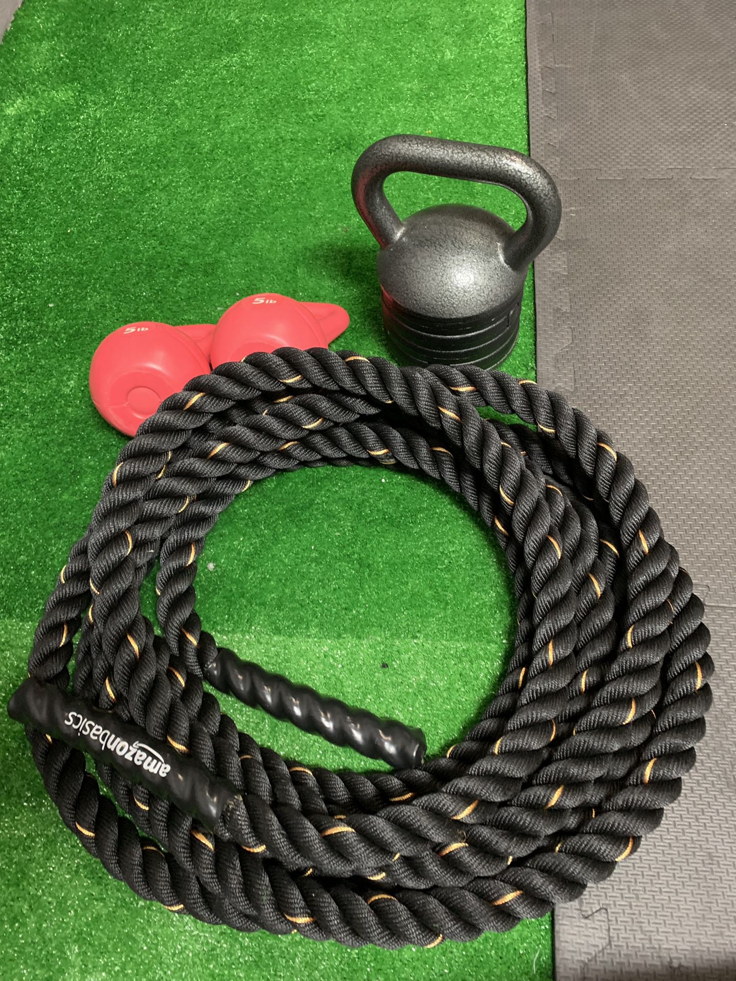 Never used Amazon basics battle rope, used adjustable kettlebell, 2 pink 5 lb kettle bell