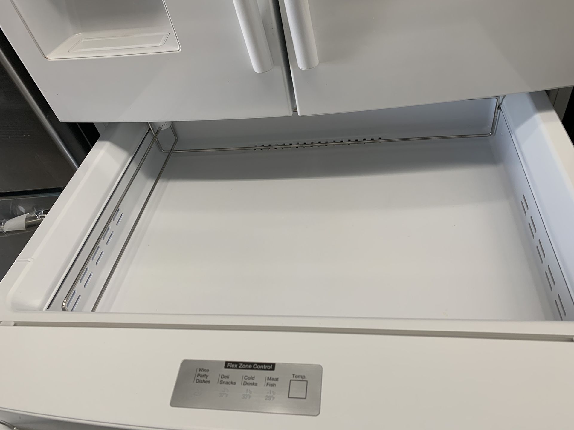 Samsung 4 door fridge in glossy white