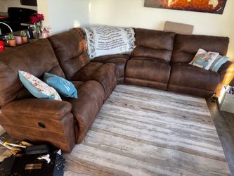 Brown sectional recliner