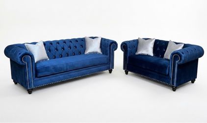 Custom chesterfield style sofa in blue fabric