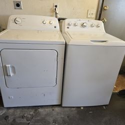 used GE top-load washer and a used Kenmore electric dryer. 