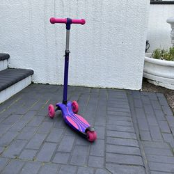 Adjustable pink and purple scooter