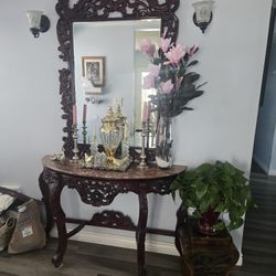 Ornate carved wood console table with marble top & matching mirror