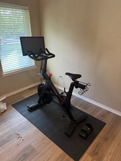 Peloton with 5 pairs of shoes