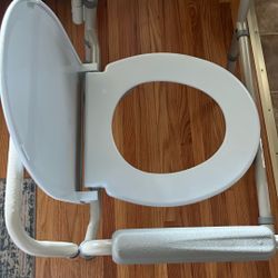 Portable toilet chair.