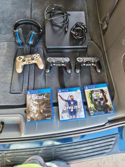 PS4 Slim Bundle with 3 Controllers and Games