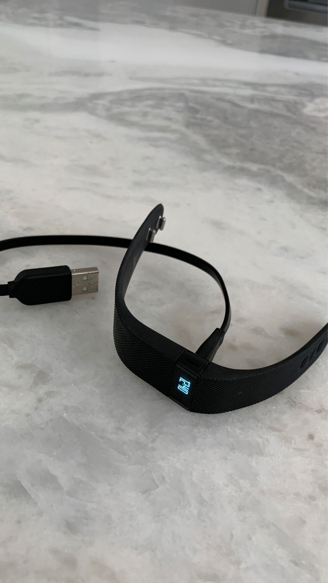 Fitbit with charging cable