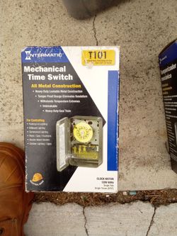 an Intermatic T101, a heavy-duty 24-hour electromechanical time switch designed for industrial, commercial, and residential applications.