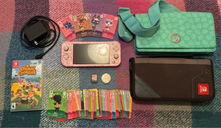 Coral/pink nintendo switch light + games & accessories !
