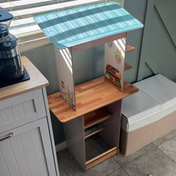 Wooden play market stand with storage made by KidsKraft. 