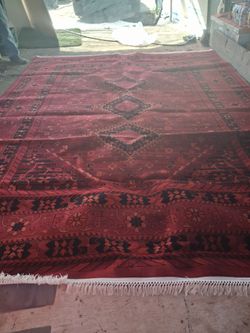 12 x 9 red rug with white tassels