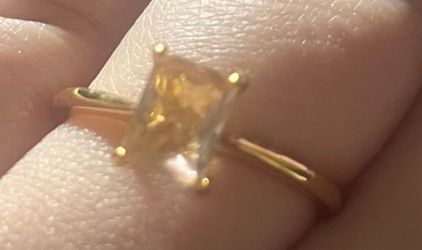 Gold ring with light pink stone