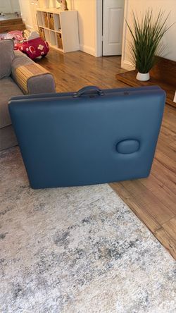Massage table