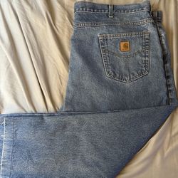 Carhartt traditional fit jeans (48 x 30).