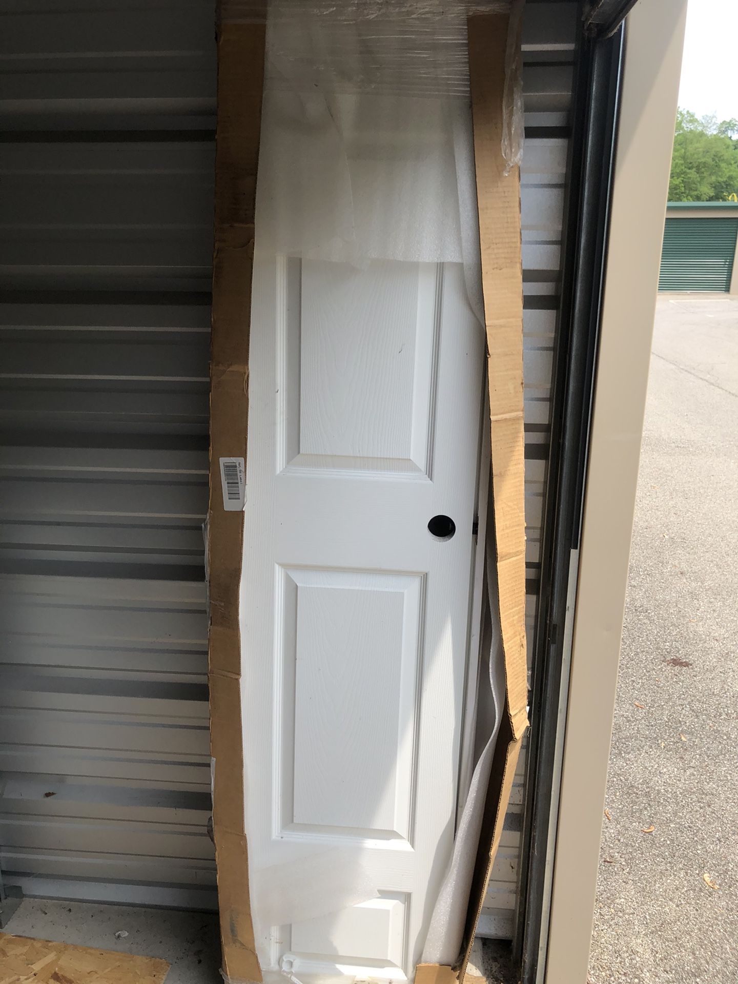18”x 80” Colonial Primed Left-handed solid core primed molded Composite single prehung interior door . 19 7/8 wide 4 1/2”deep 82 1/2” tall with Frame