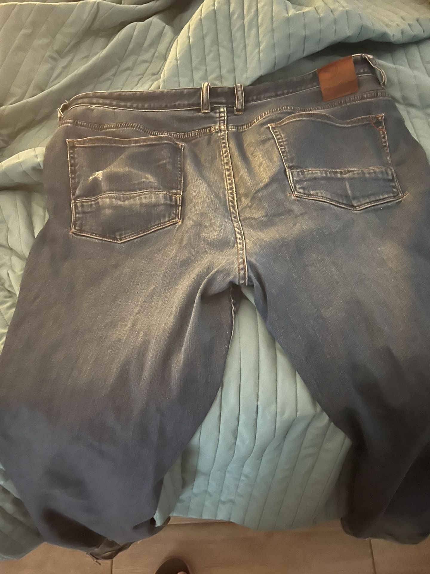 Well Worn Used Tommy Bahama jeans 38x30