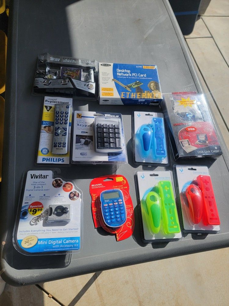 Lot Of 10 Items Mino Camera, Calculator, DS Starter Kit, PCI Card Electronics, and More