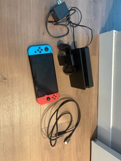 Nintendo Switch with Neon Joy-Cons and Accessories