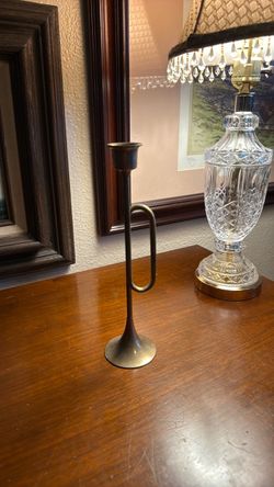vintage brass trumpet or bugle-shaped candlestick holder