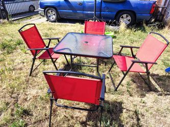 Mainstays Albany lane 5 piece outdoor dining features a red tempered glass table and foldable chairs